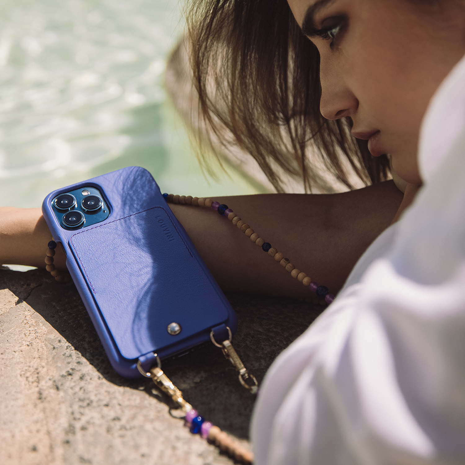 Coque iPhone cuir porte carte avec anneaux LOU - Violet