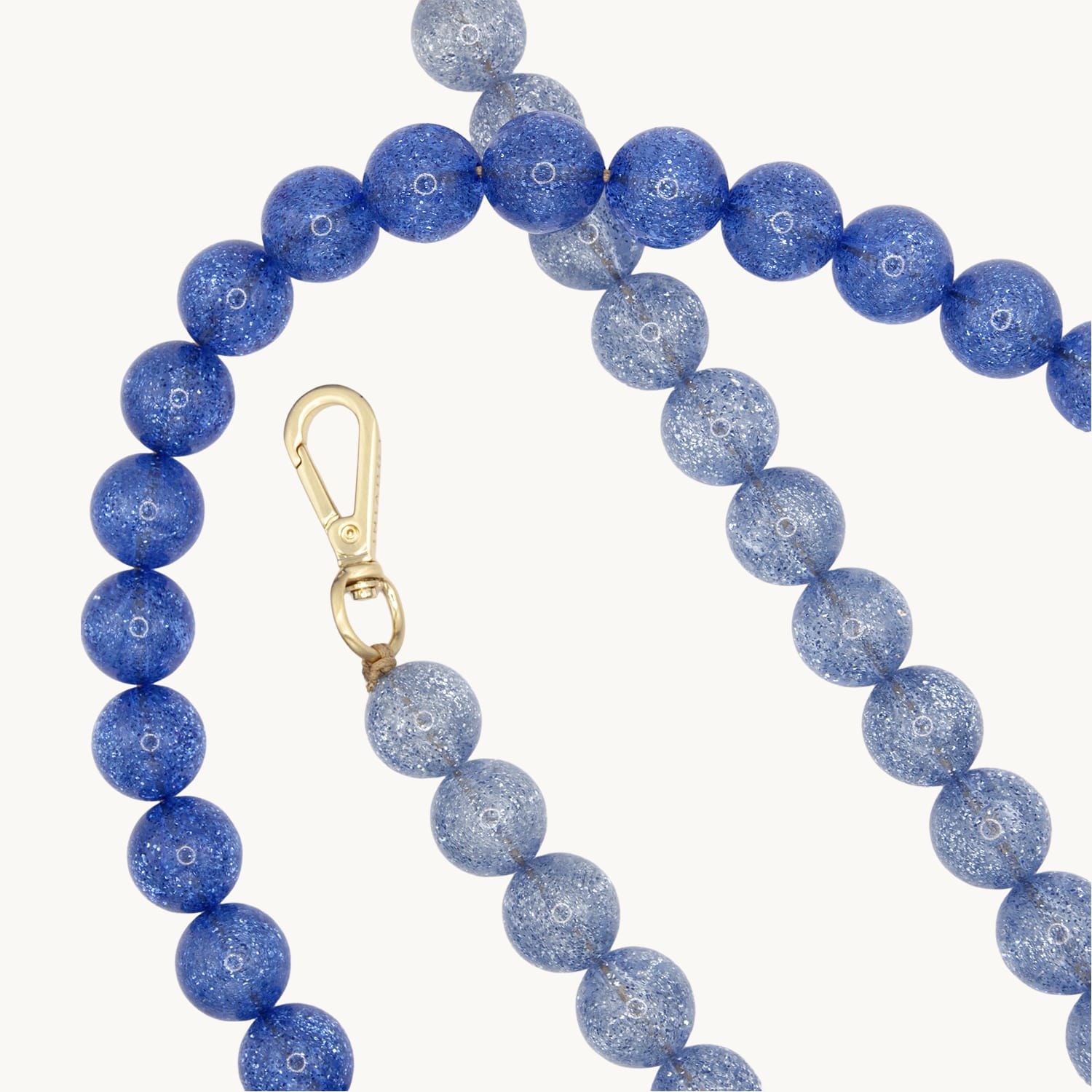 chaine bandouliere pour telephone a perles degrade transparent