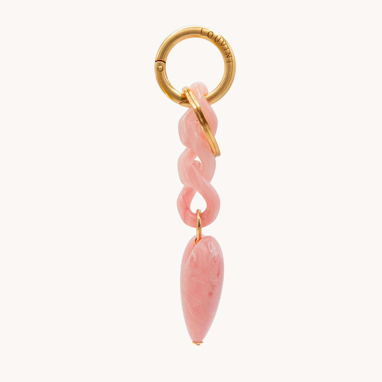 Porte-clés avec mousqueton doré, chaîne en résine rose et pendentif cœur effet marbre