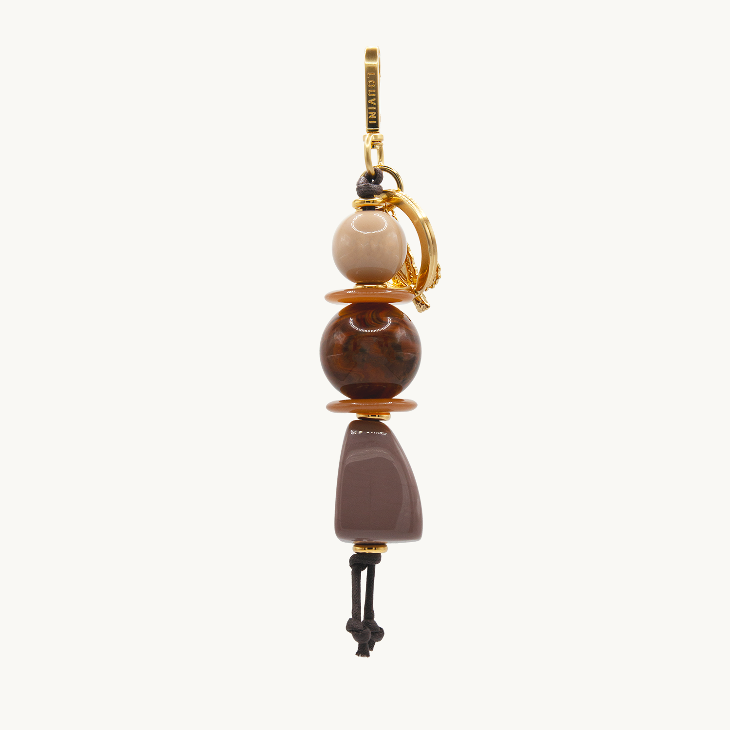 Porte-clés doré avec mousqueton, anneau et perles décoratives effet marbre marron et beige