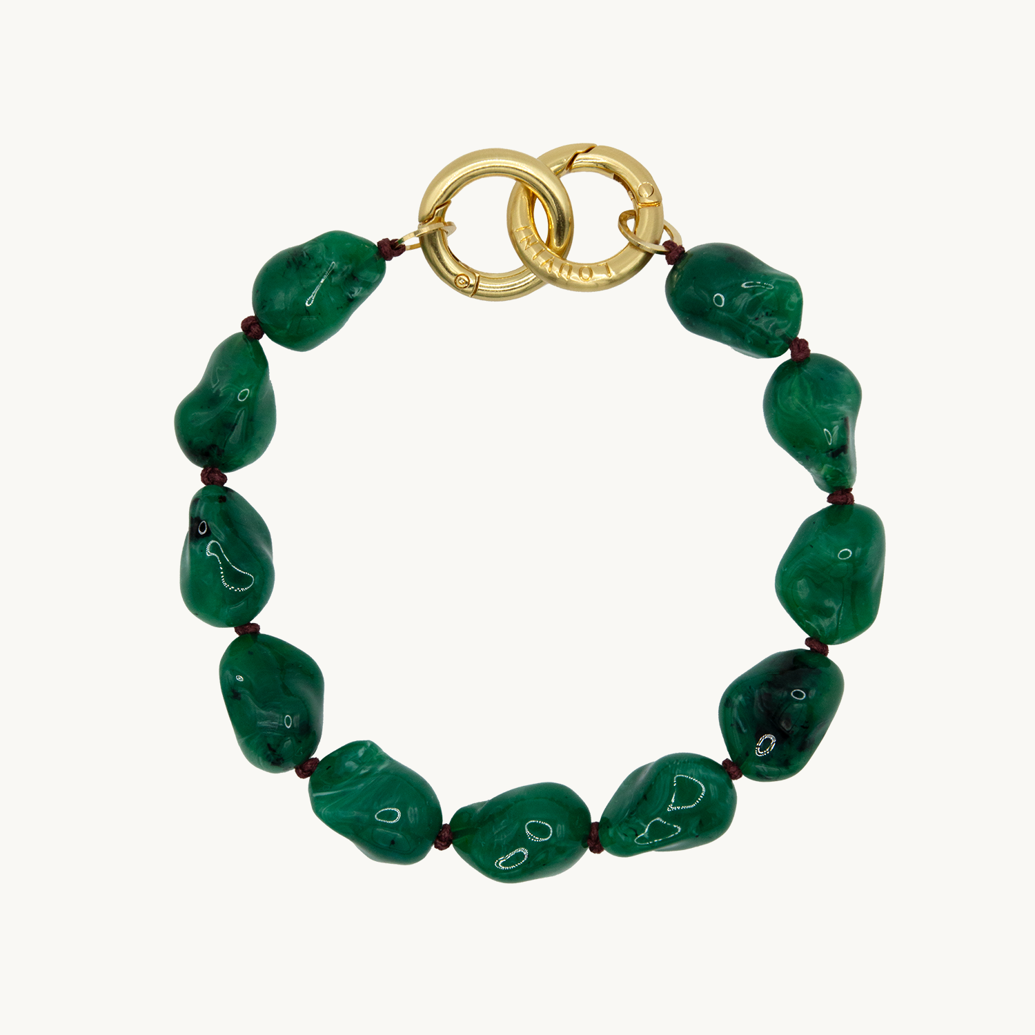 Petite chaîne de telephone bracelet vert avec pierres en résine et anneaux dorés