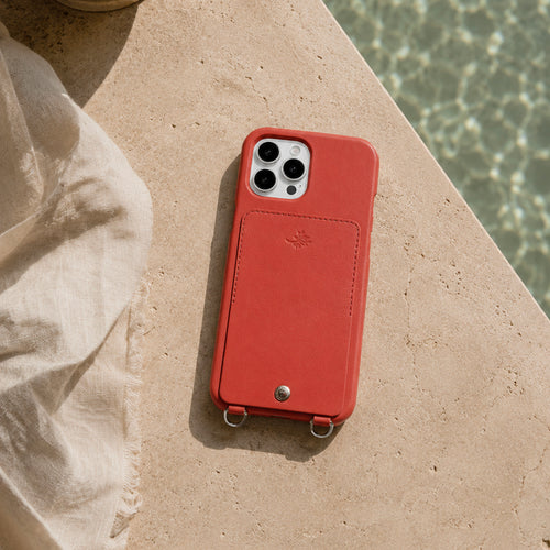 coque iphone en cuir orange avec porte carte et anneaux louvini x airelles