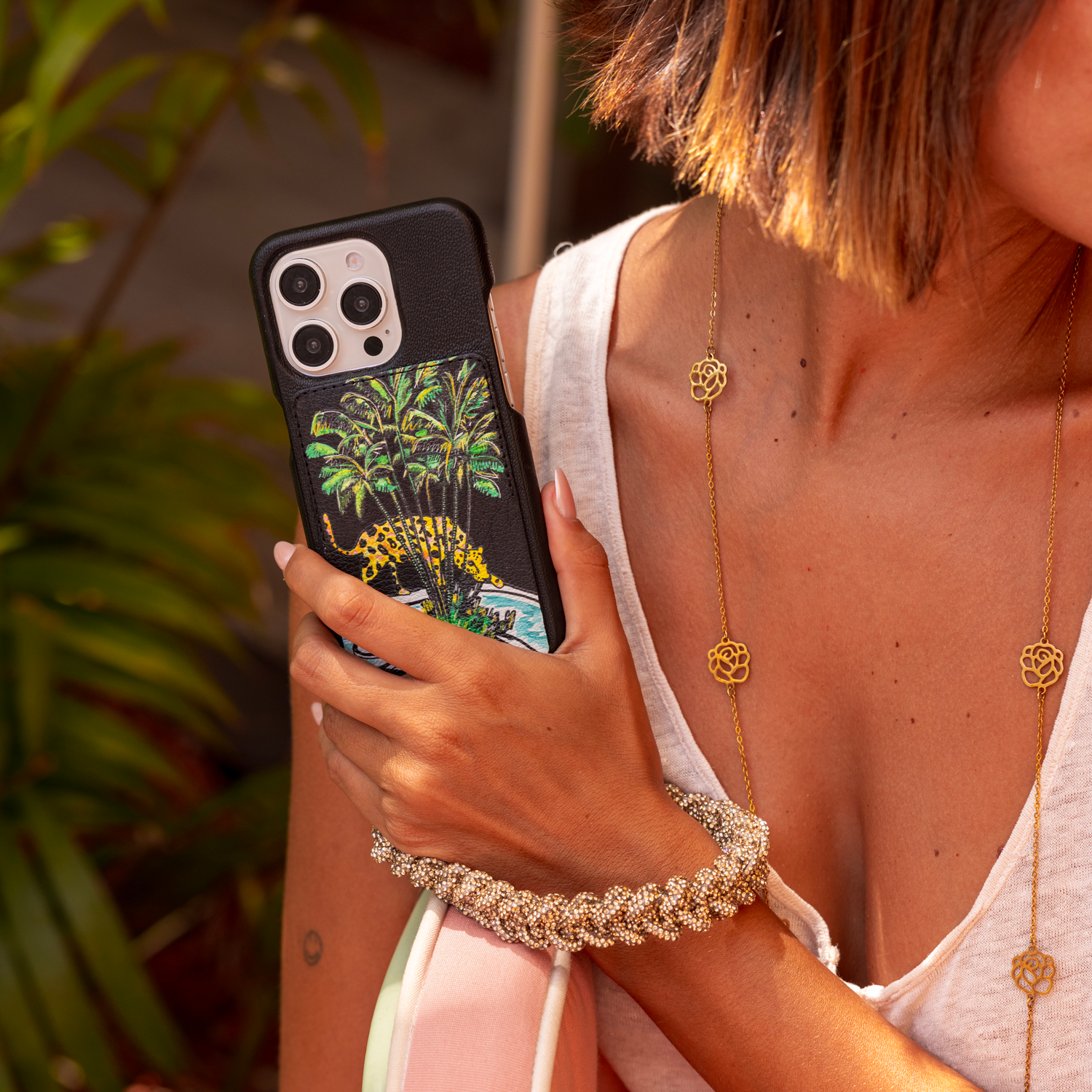 coque iphone en cuir lou filipe jardim noir avec bracelet de téléphone à strass doré