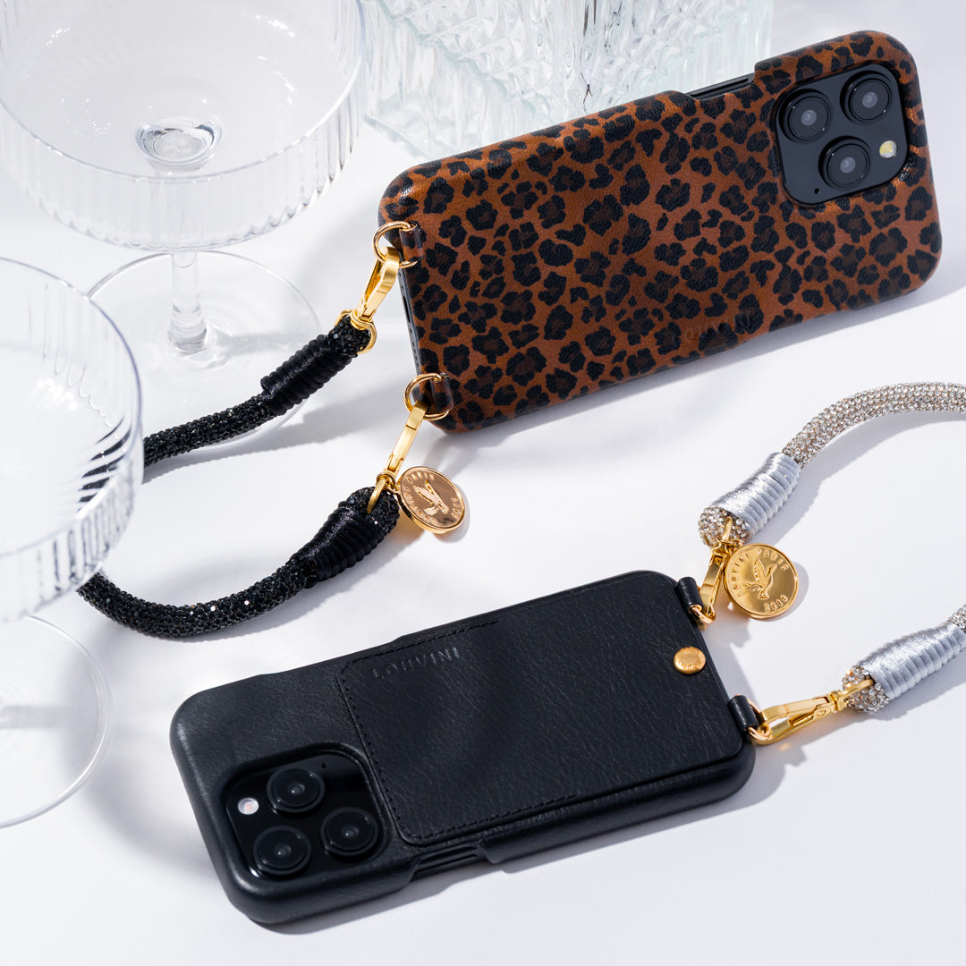 coques iphone en cuir leopard noir et bracelets de téléphone à strass noir et argenté