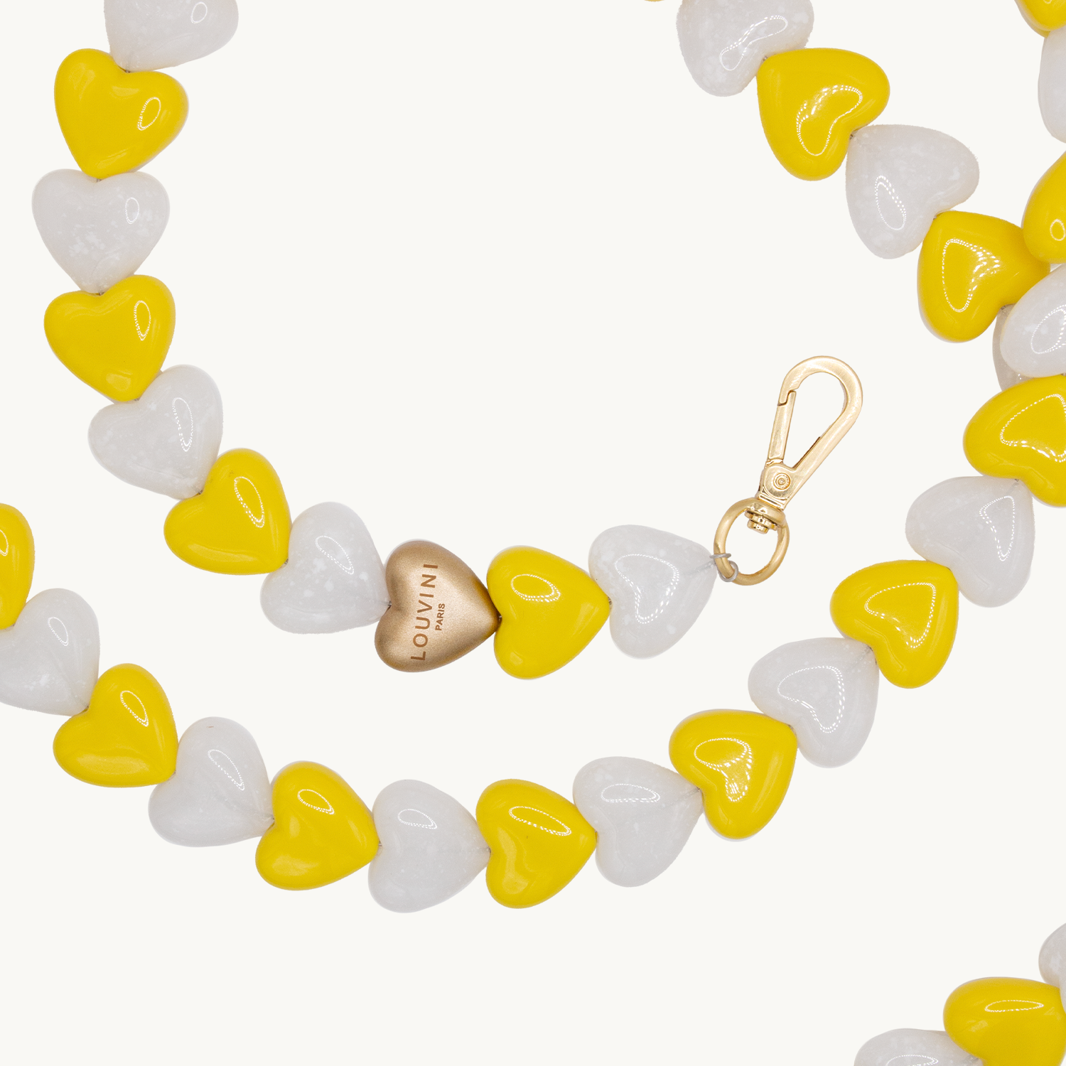 Chaîne de telephone coeur jaune blanc
