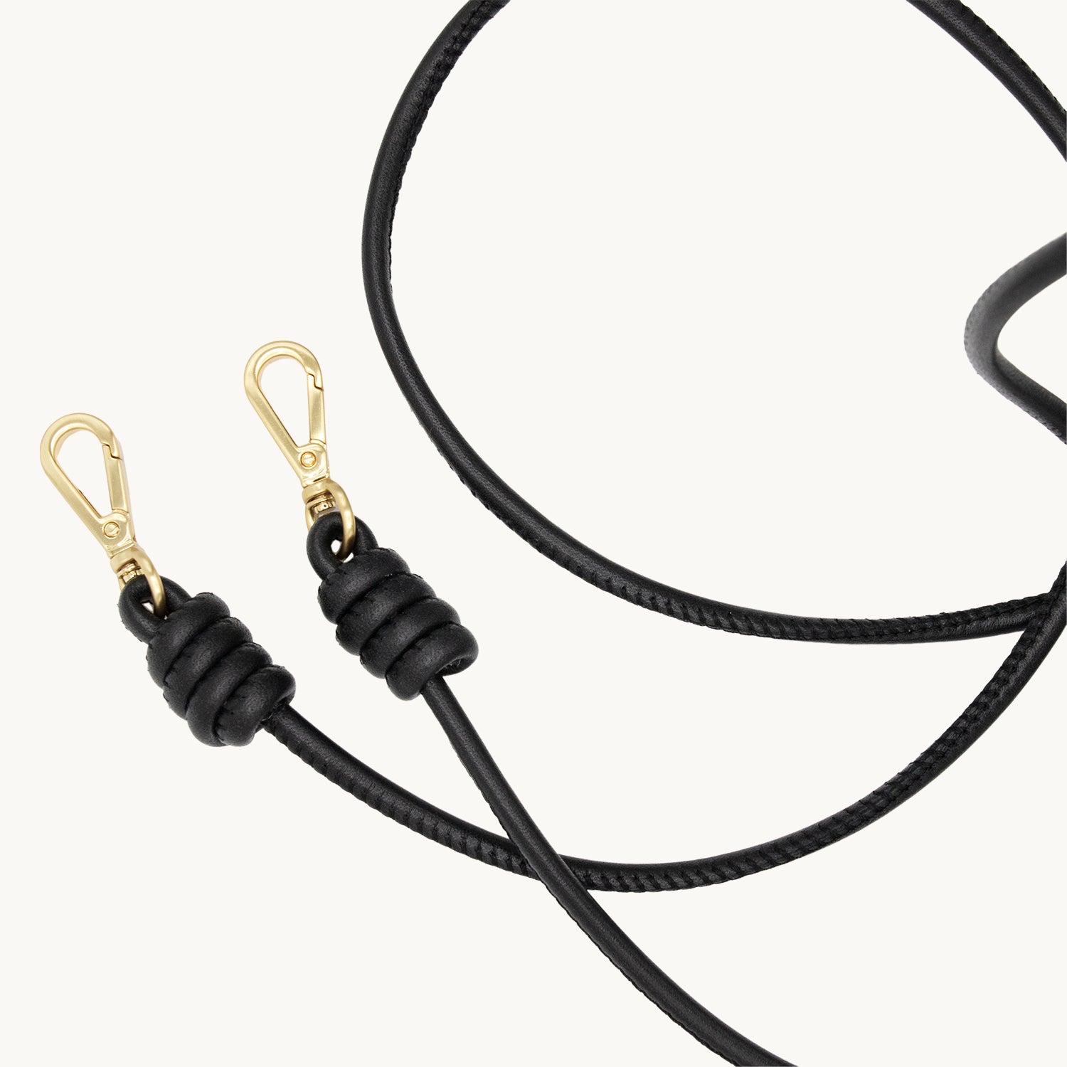 Cordon de telephone bandouliere en cuir noir