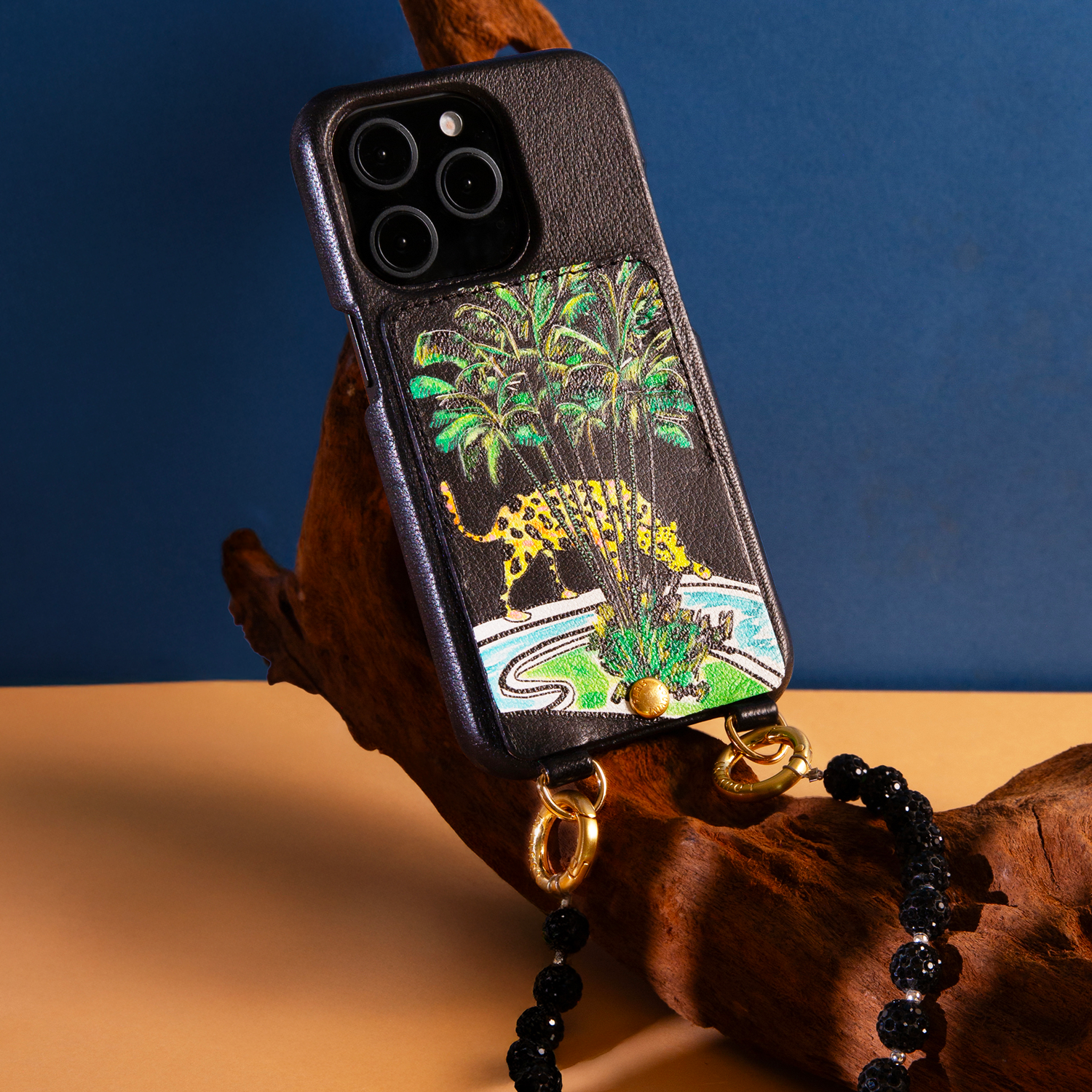 coque iphone en cuir avec anneaux imprimé tropical léoopard et porte-carte intégré
