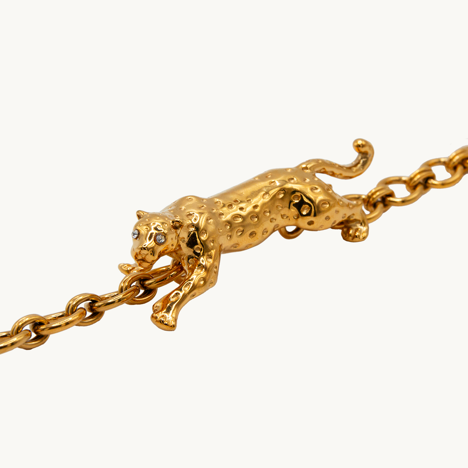 Bracelet de telephone a maillon dore avec pendentif leopard
