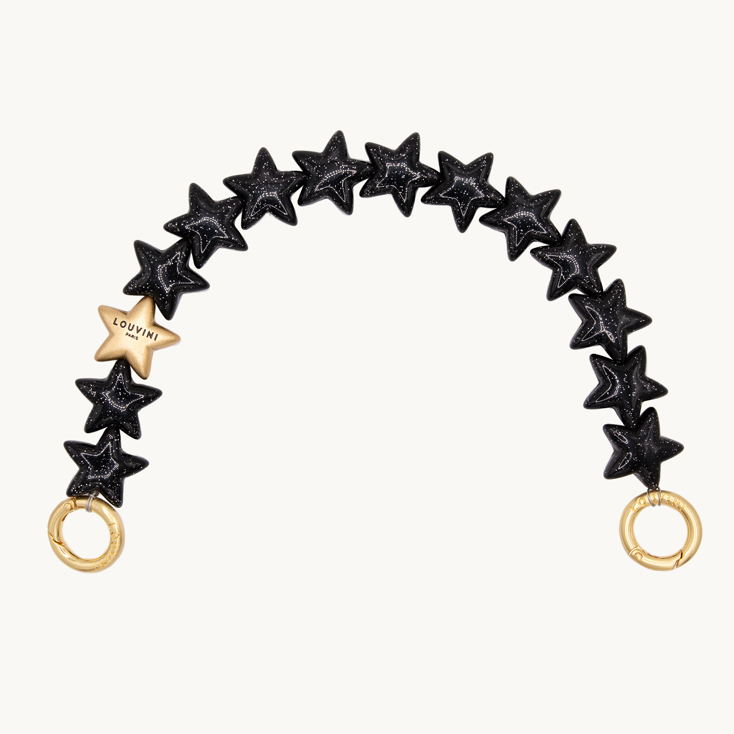 Bracelet de téléphone étoiles noir à paillettes et anneaux dorés