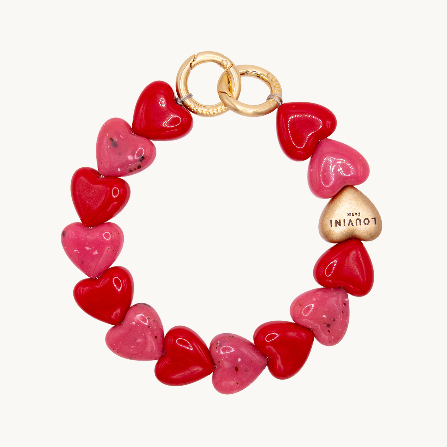 bracelet de telephone a coeurs en resine rouge et rose