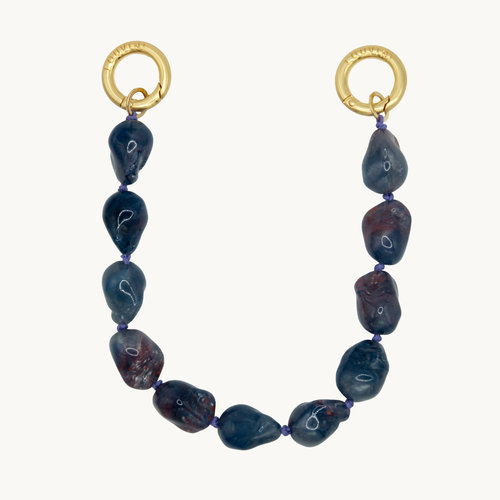 Bracelet pour téléphone avec pierres en résine et anneaux dorés