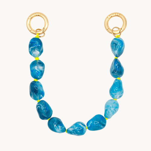 Bracelet pour téléphone avec pierres en résine et anneaux dorés