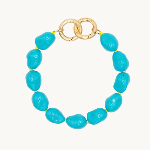 Bracelet pour téléphone avec pierres en résine et anneaux dorés