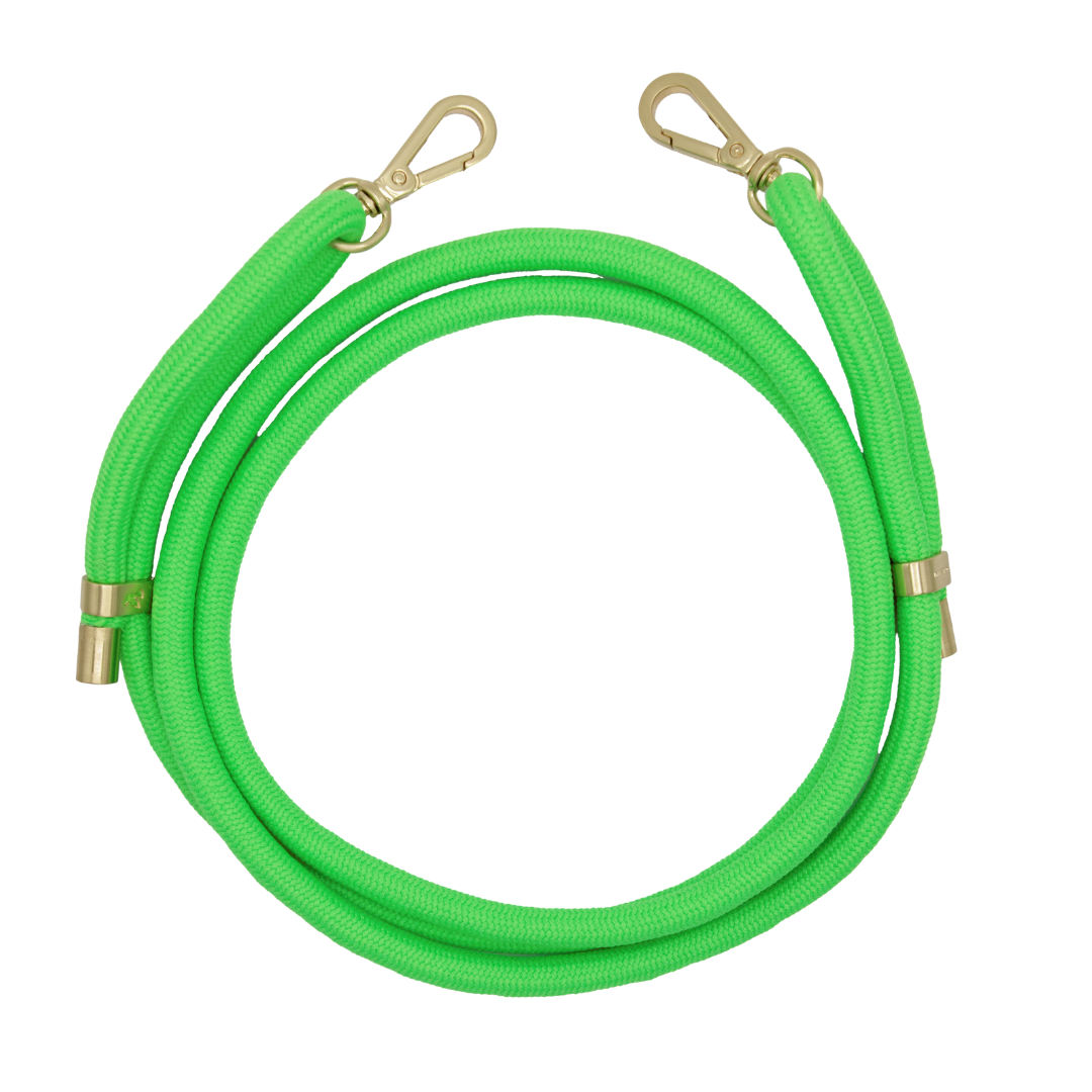 cordon ajustable pour téléphone vert fluo sur fond blanc