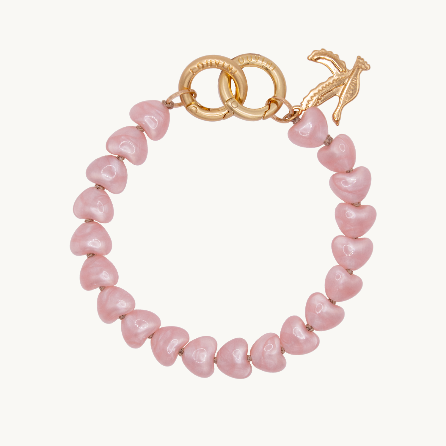 bracelet de téléphone à perles petits coeurs roses et anneaux dorés