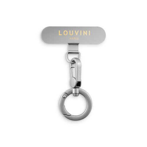 Adaptateur universel pour cordon et chaîne de téléphone installé sur coque smartphone