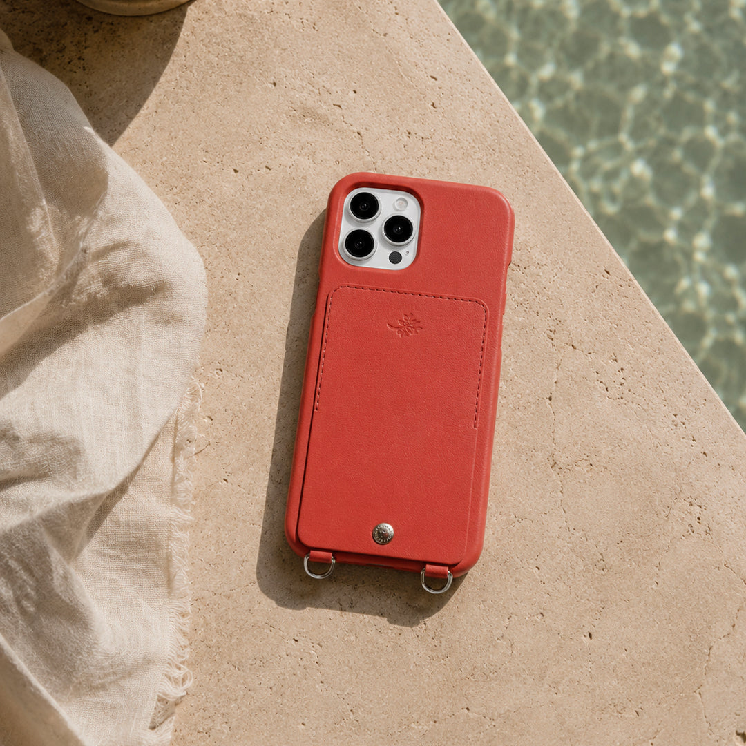 coque iphone en cuir orange avec porte carte et anneaux louvini x airelles