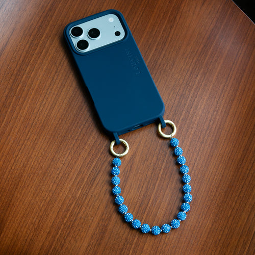 coque iphone magsafe bleu marine et bracelet de téléphone à perles strass bleu